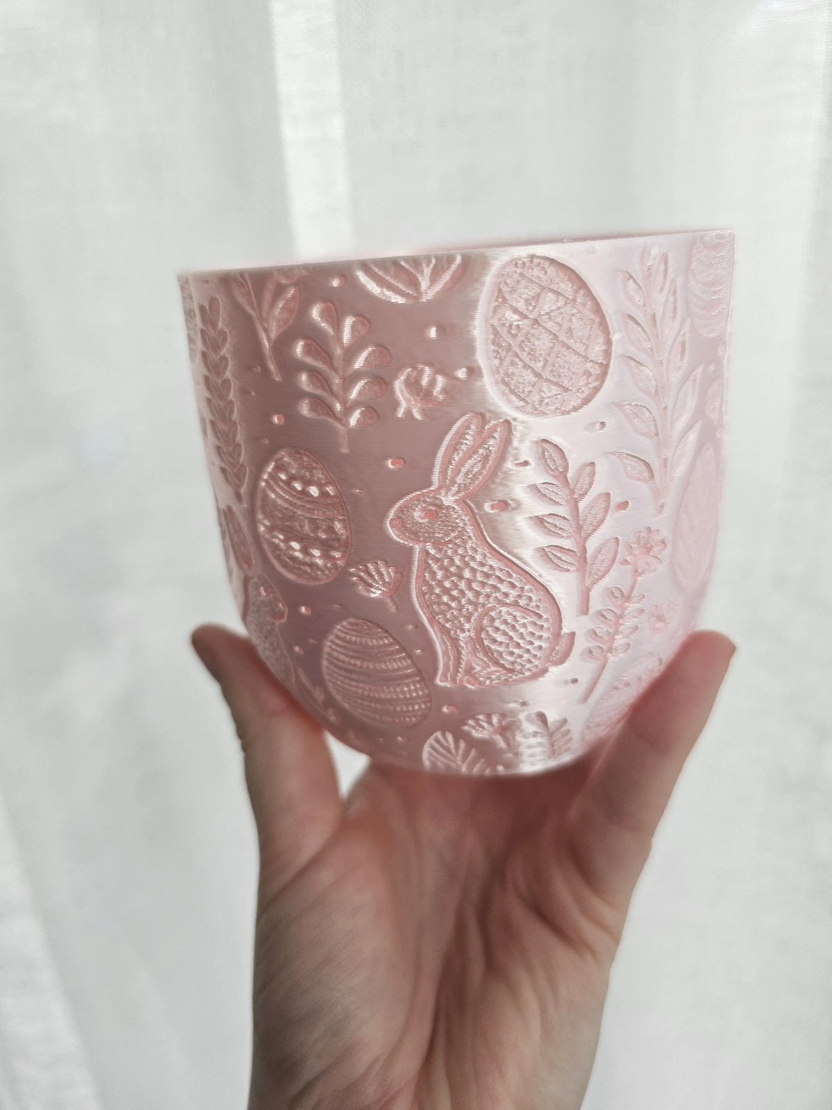 Easter flowerpot decorated with vibrant spring blooms, perfect for seasonal home decoration and festive ambiance