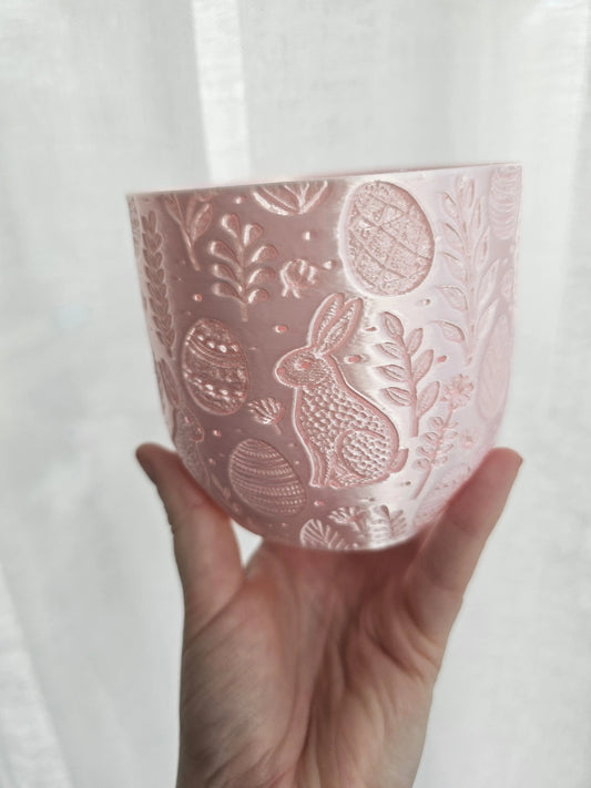 Easter flowerpot decorated with vibrant spring blooms, perfect for seasonal home decoration and festive ambiance