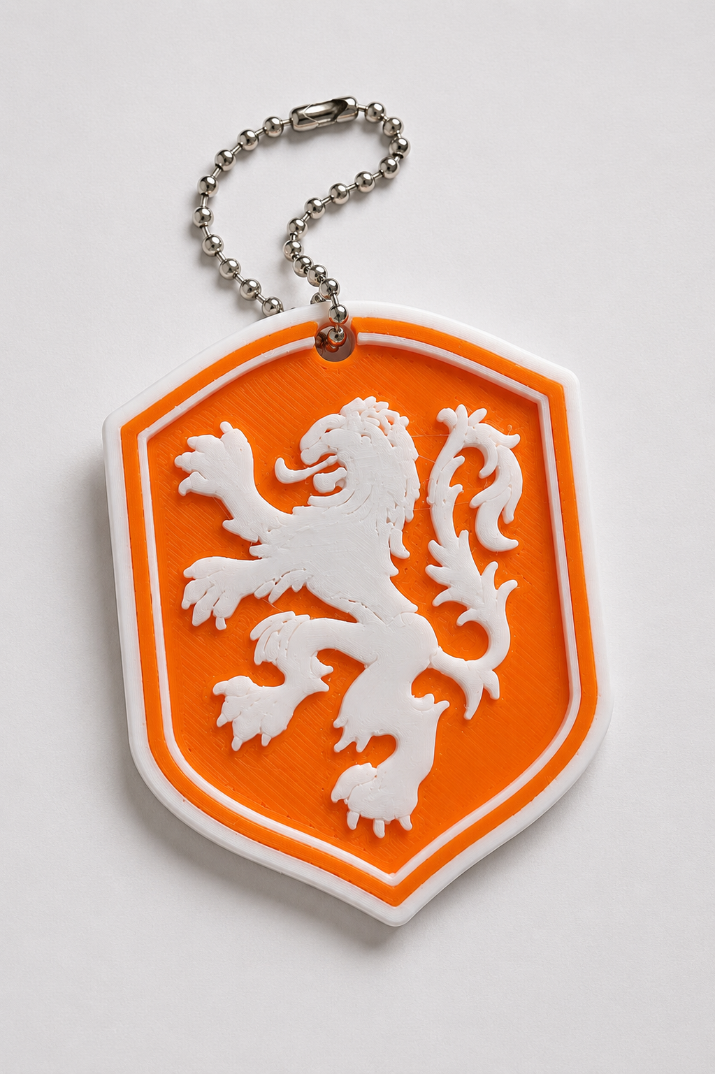 Oranje sleutelhanger met Nederlandse leeuw – 3D-geprint – Wit en oranje