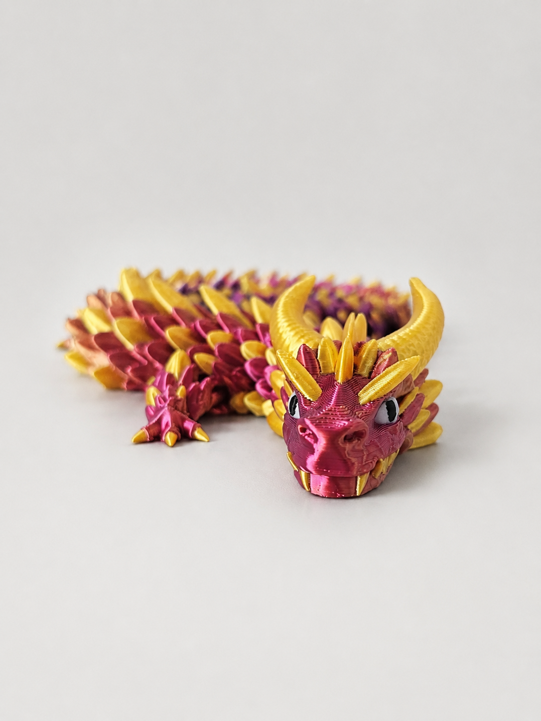Grote beweegbare draak – 3D-geprint in paars en goud